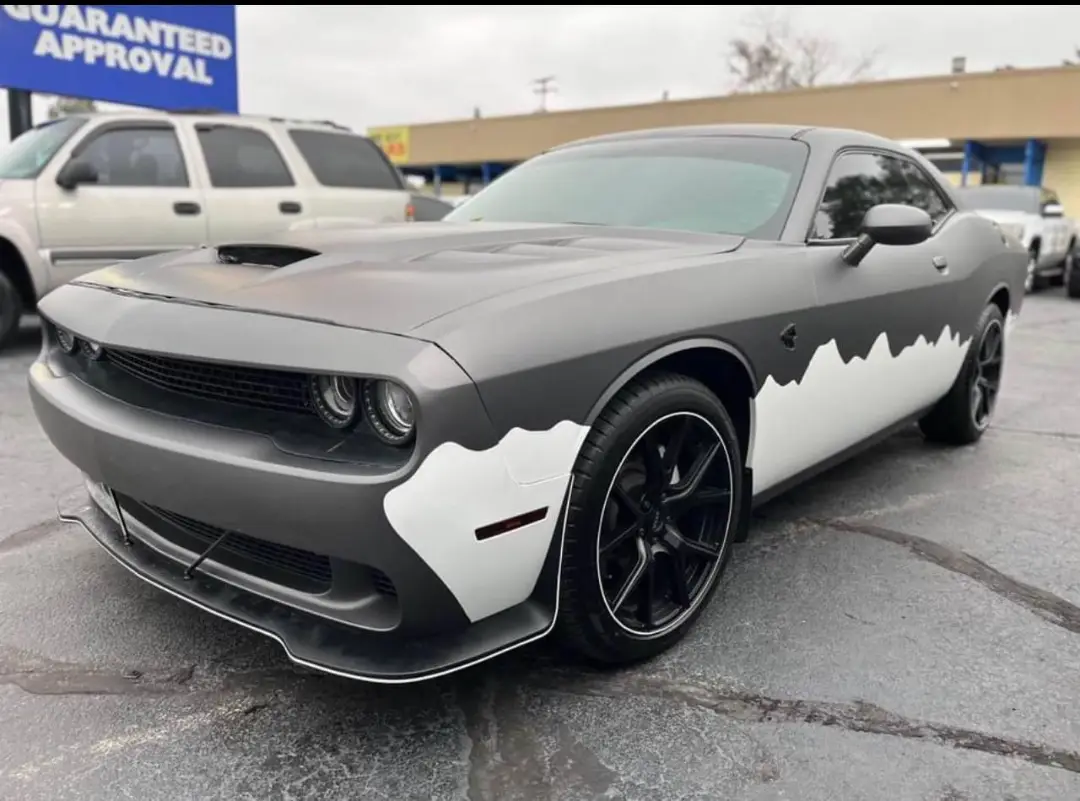 Custom black and white wrap Dodge Challenger SXT Plus
