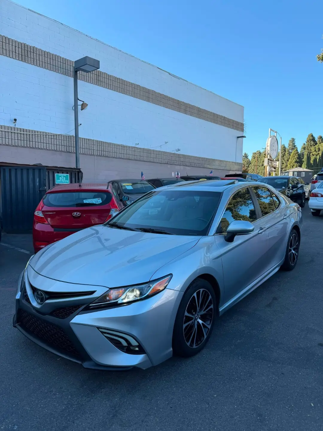 Silver Toyota Camry SE